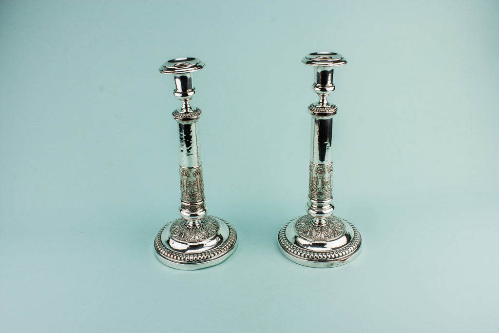 2 tall candlesticks