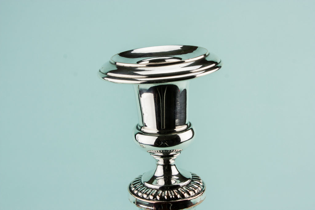 2 tall candlesticks
