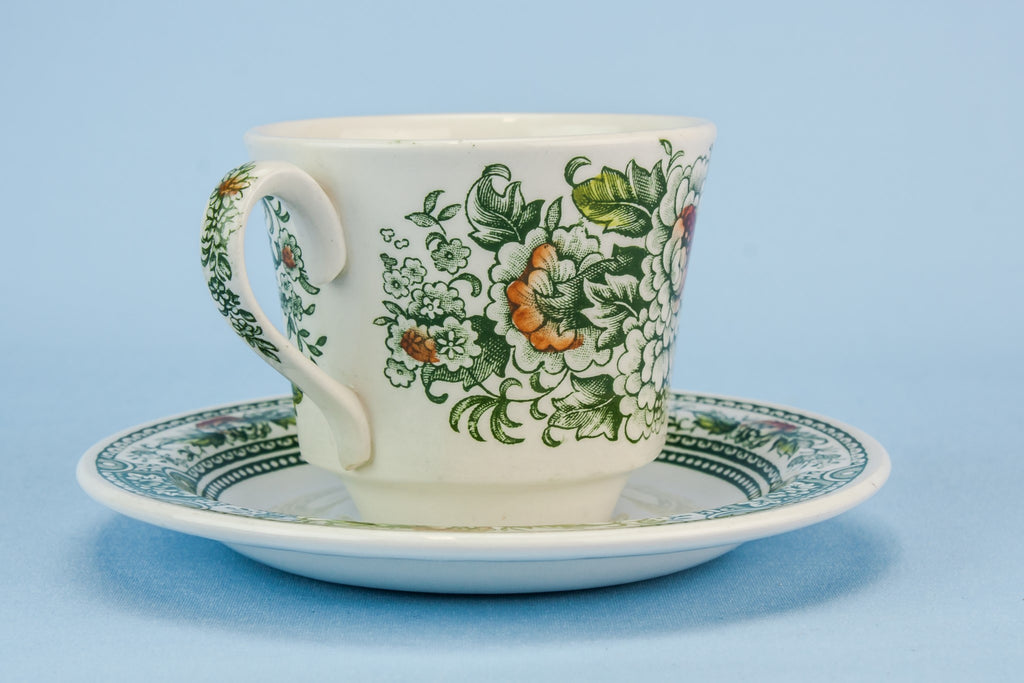 Green teacup and saucer