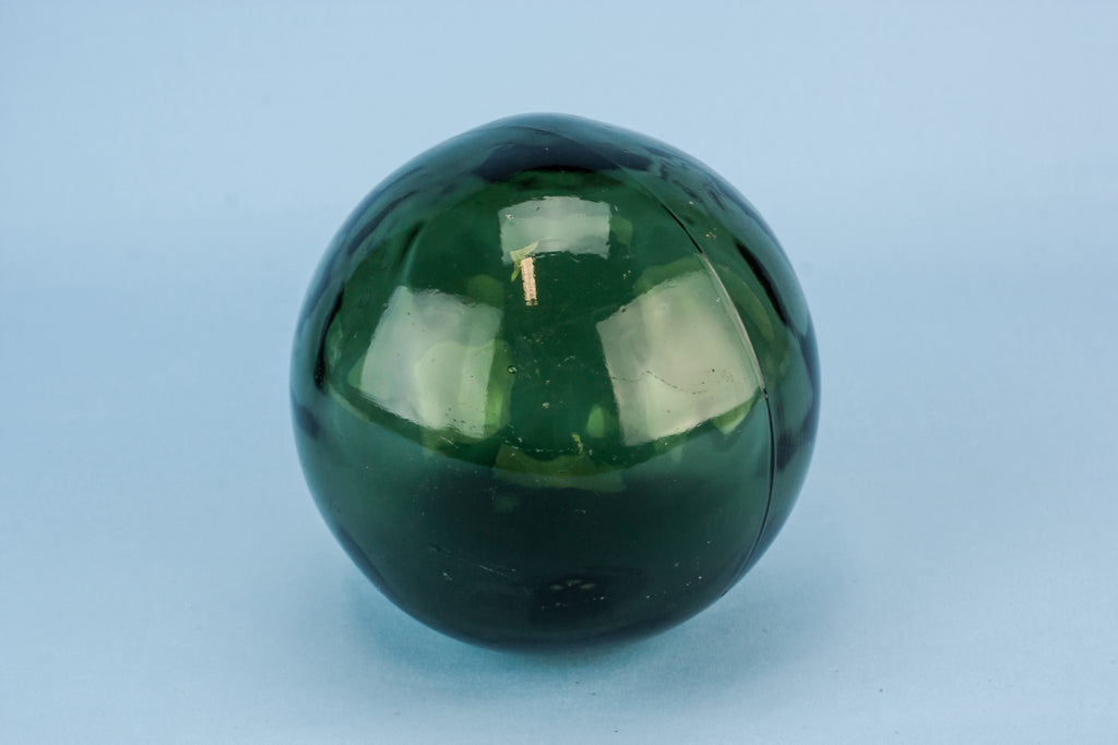 Green glass witches ball