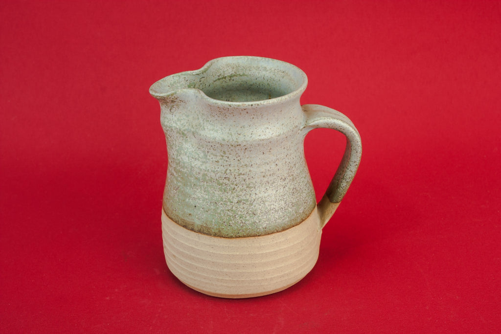 Grey pottery creamer
