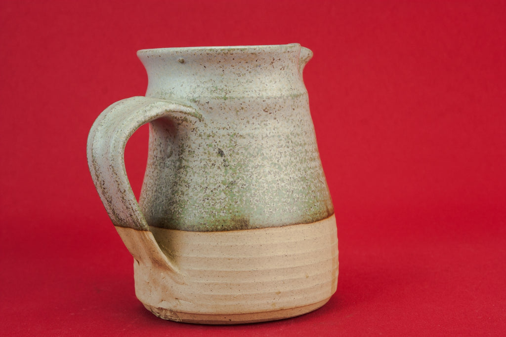 Grey pottery creamer