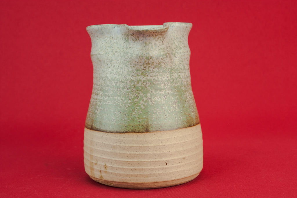 Grey pottery creamer
