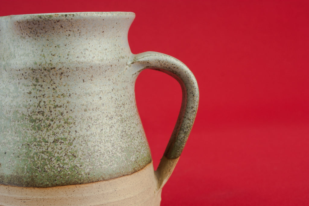 Grey pottery creamer