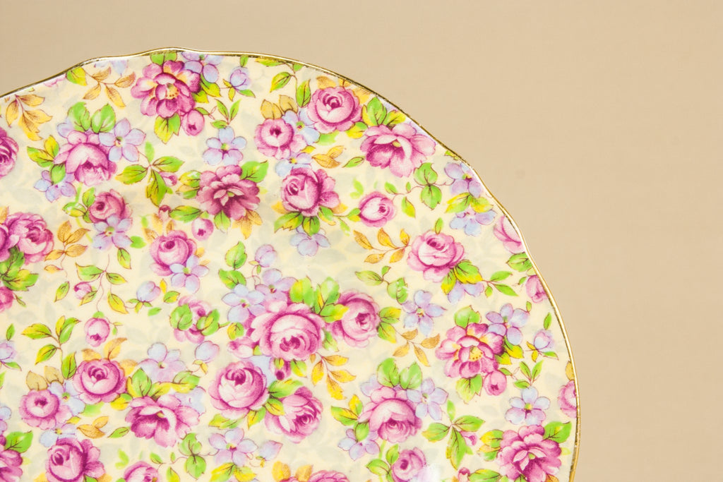 2 chintz pottery plates