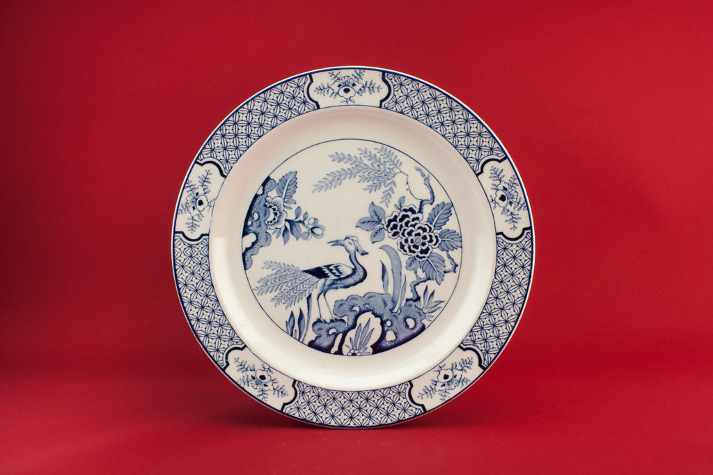 4 blue and white dinner plates