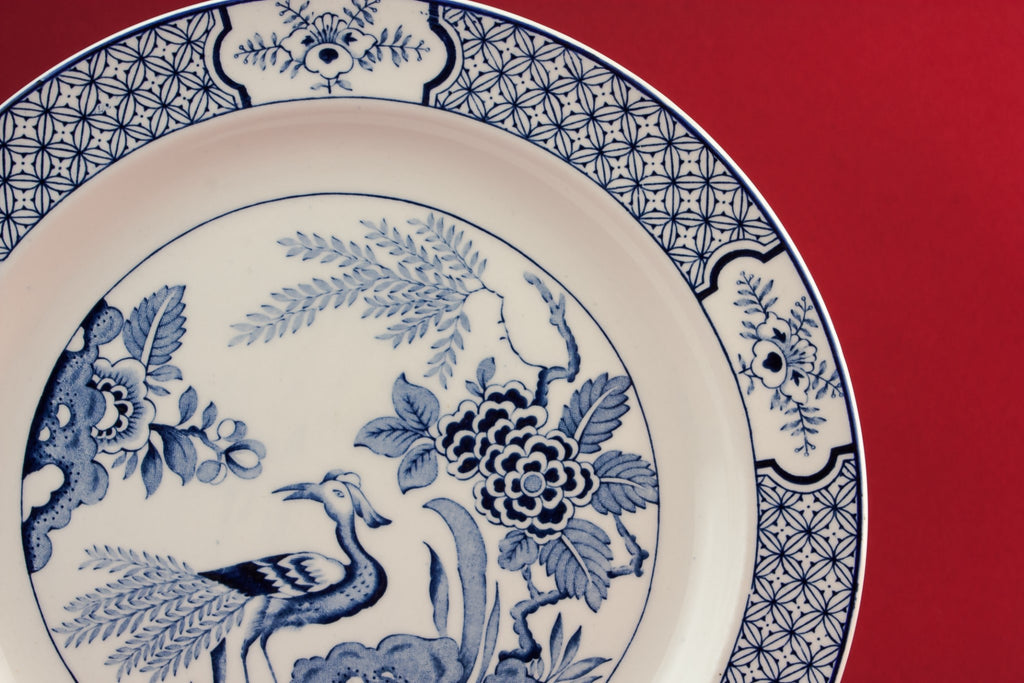 4 blue and white dinner plates