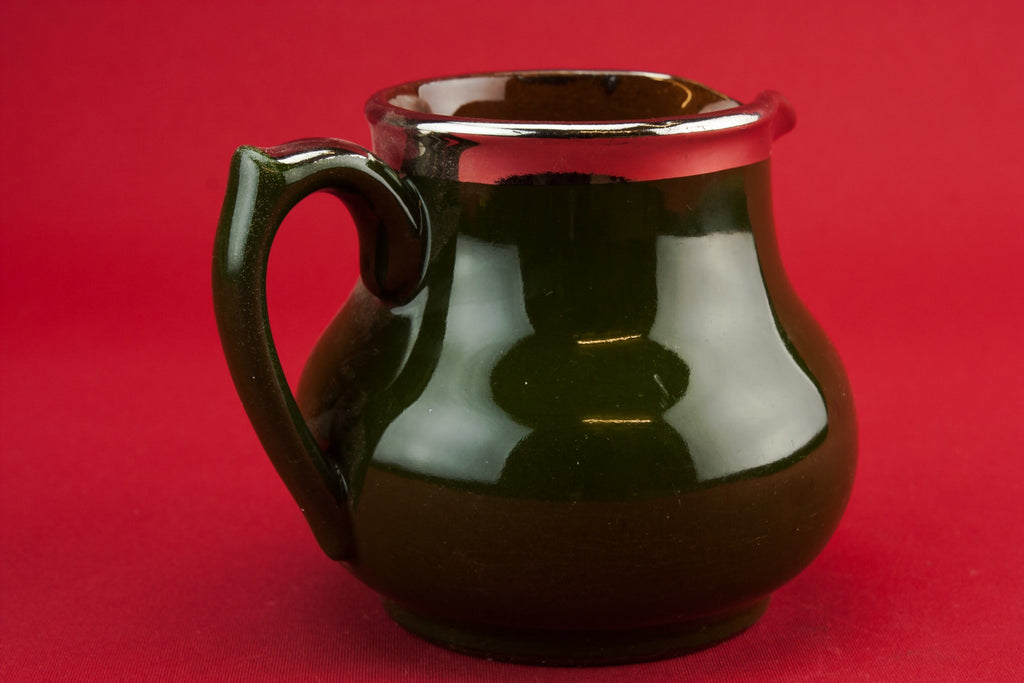 Traditional pottery creamer