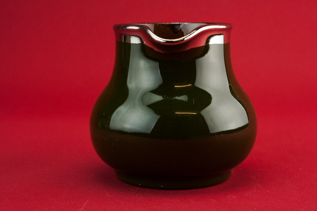 Traditional pottery creamer