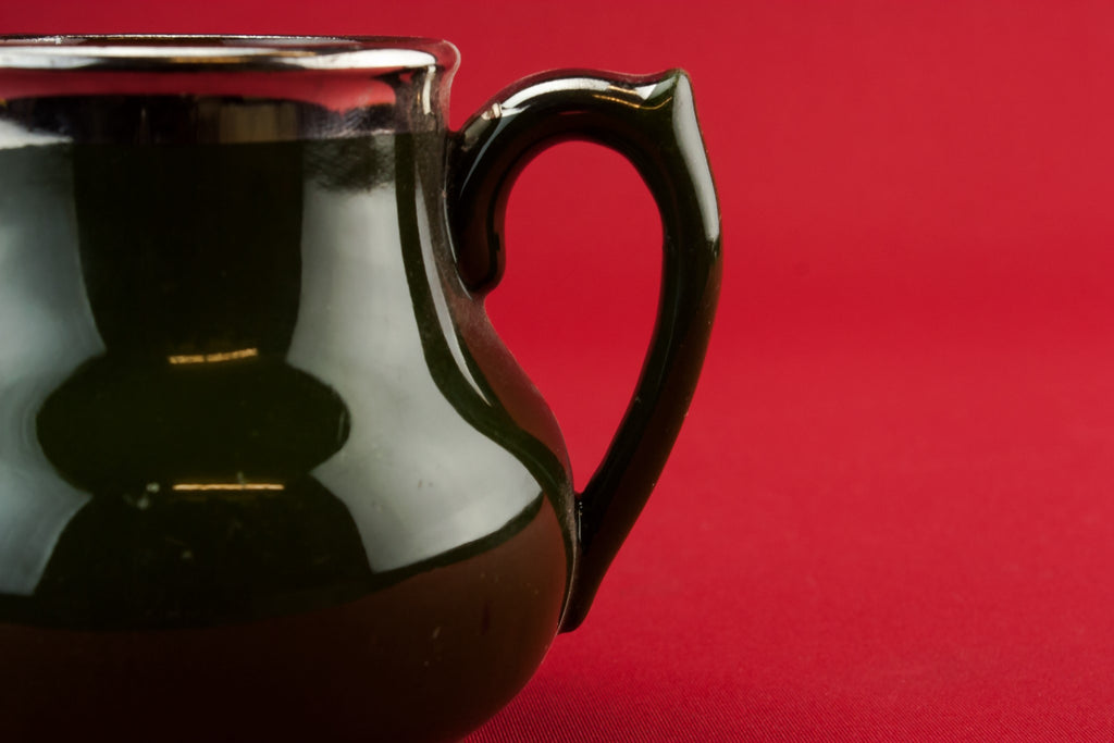 Traditional pottery creamer