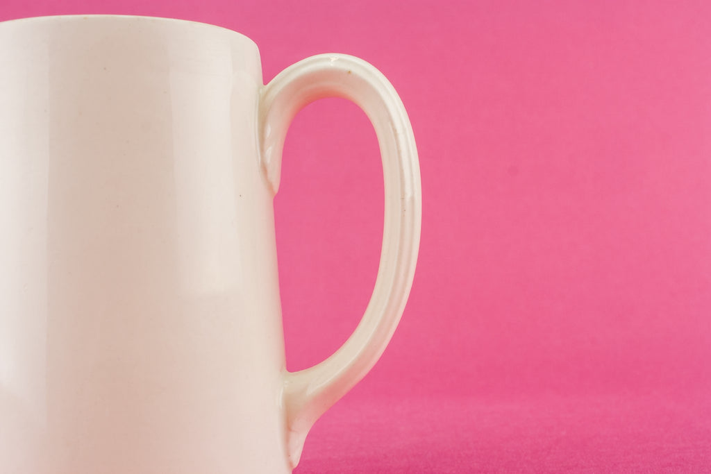 White pottery creamer
