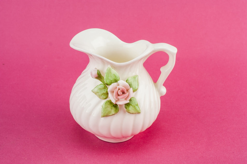 White pottery creamer