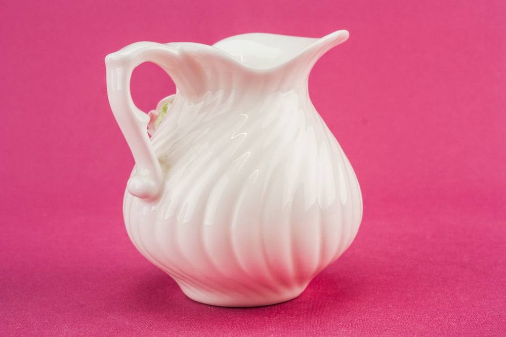 White pottery creamer
