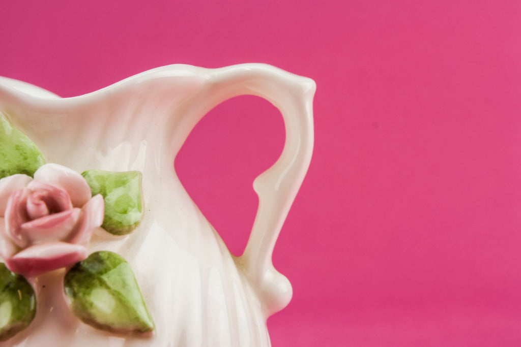 White pottery creamer