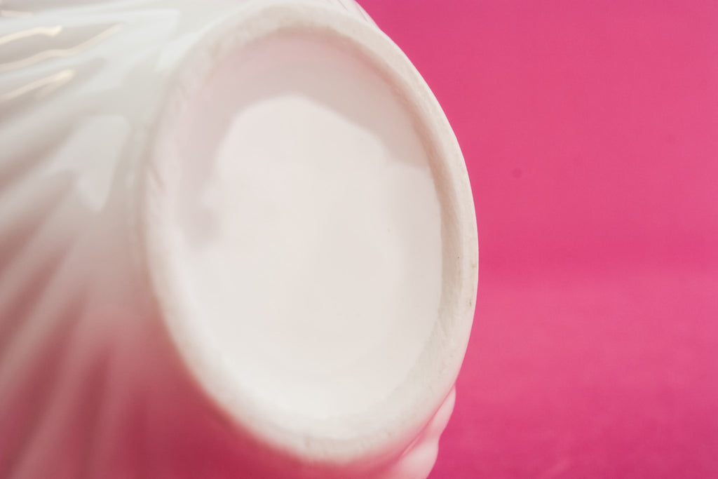 White pottery creamer