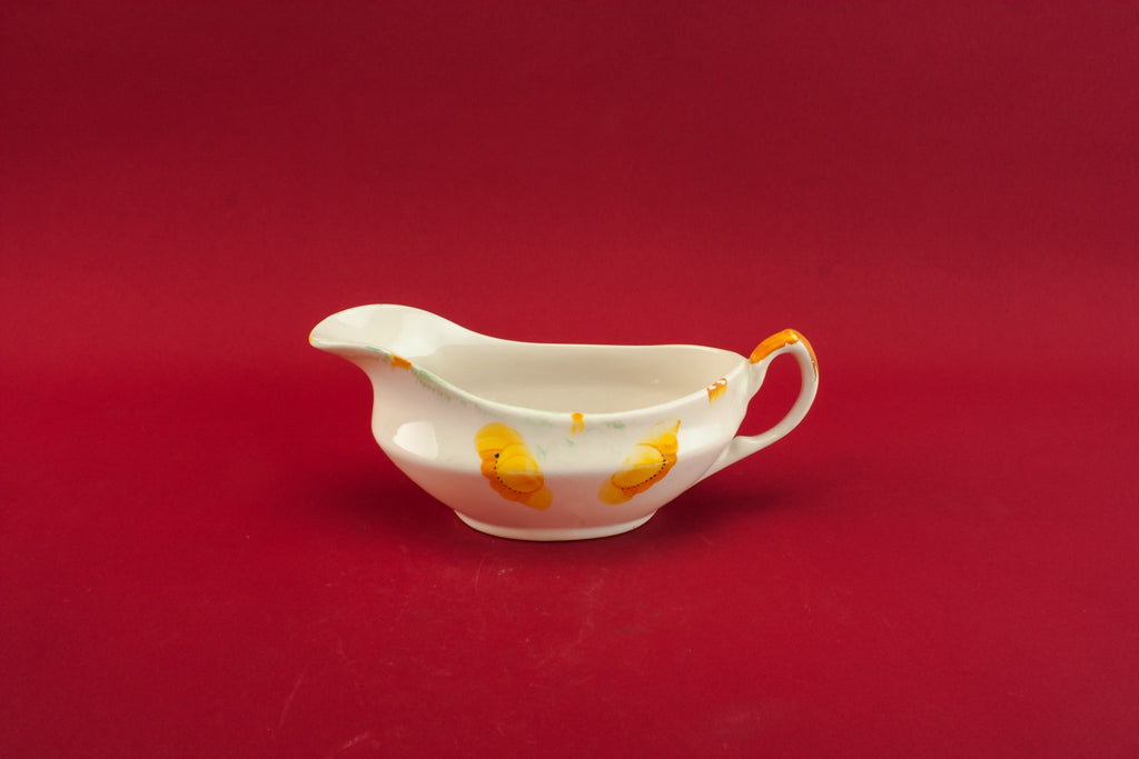 Traditional pottery gravy boat