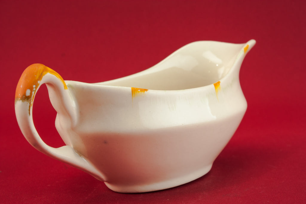 Traditional pottery gravy boat