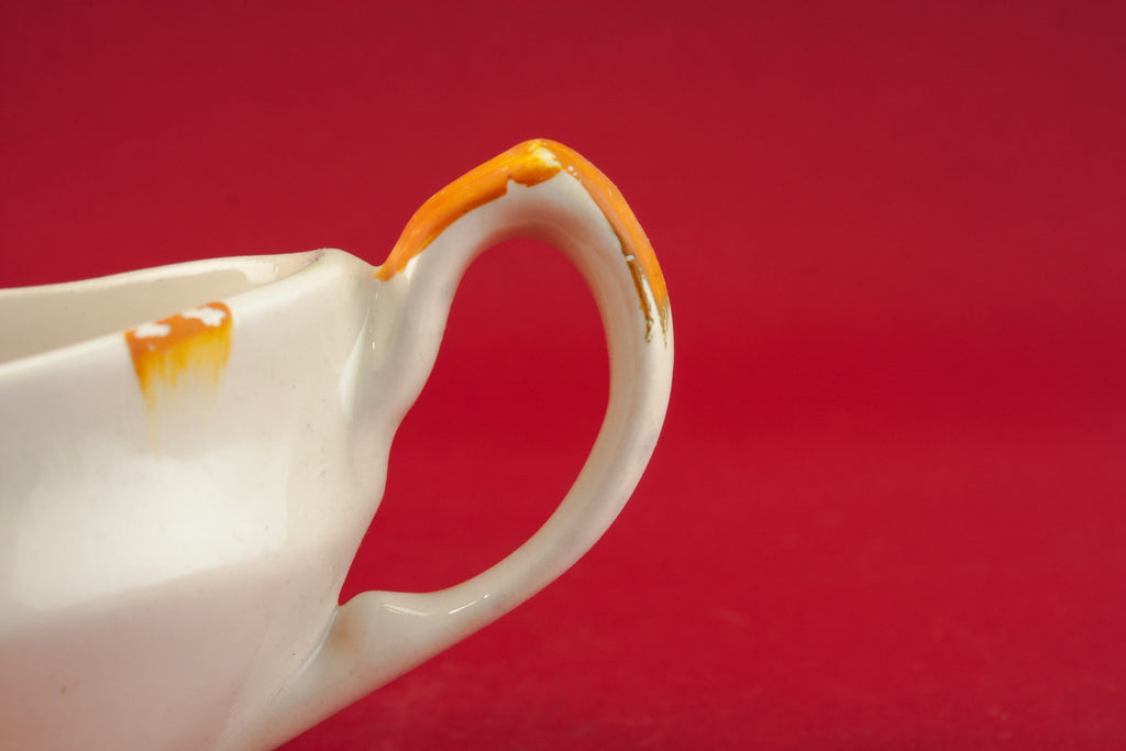Traditional pottery gravy boat