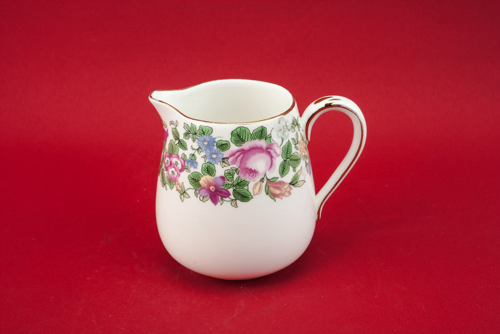 Green pottery creamer
