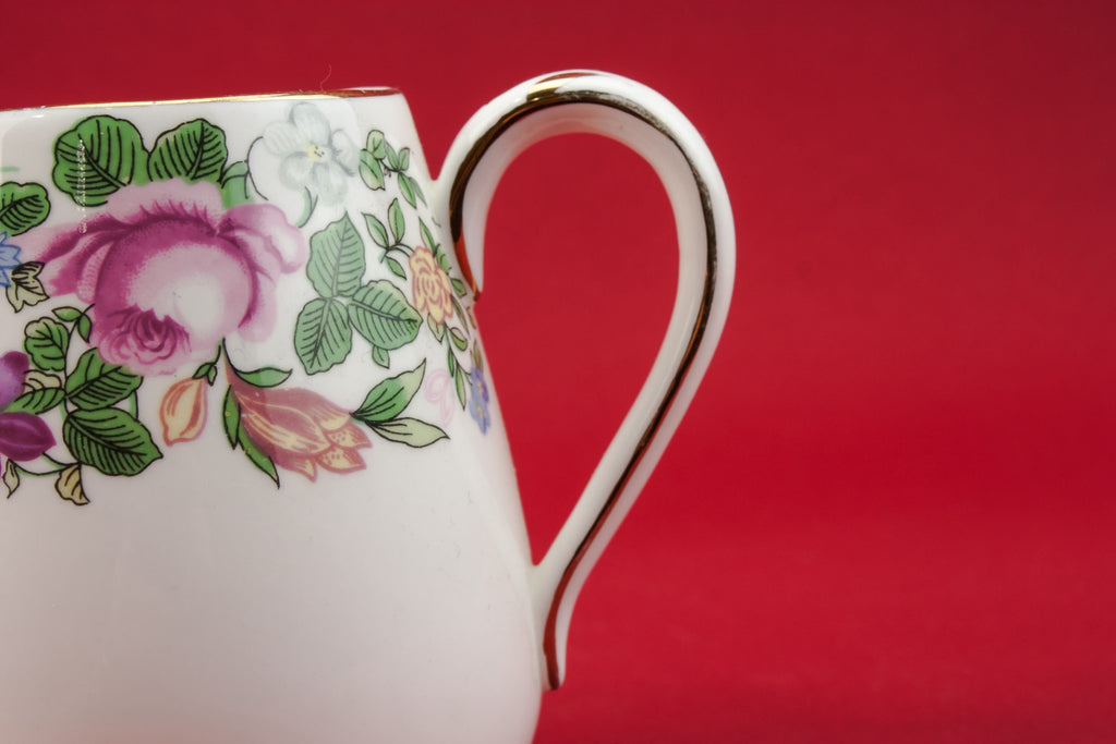 Green pottery creamer