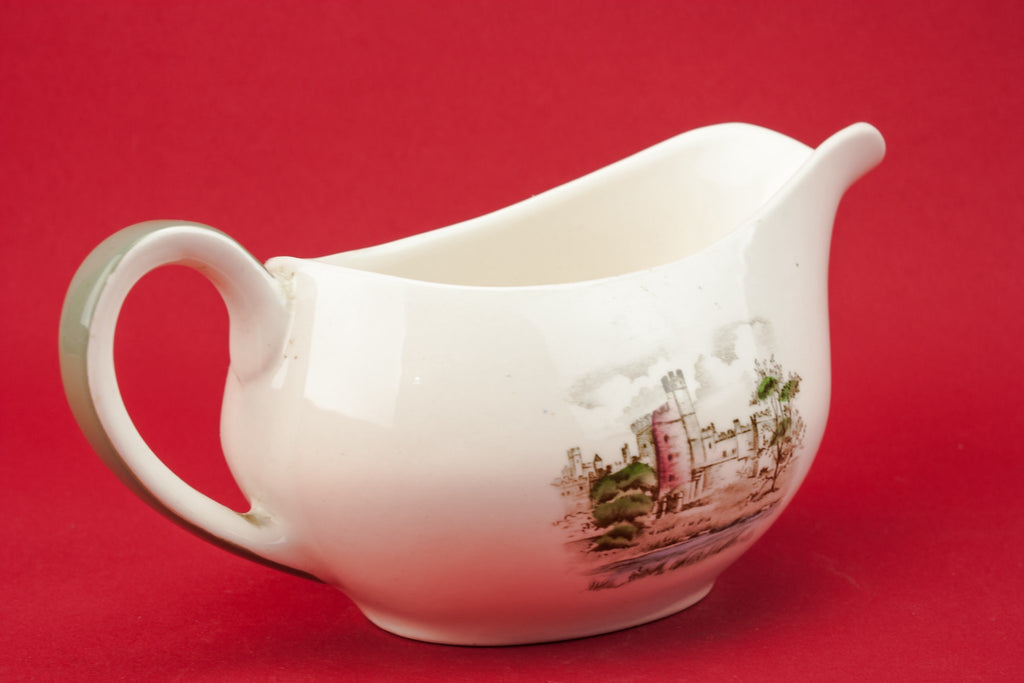 Traditional pottery gravy boat