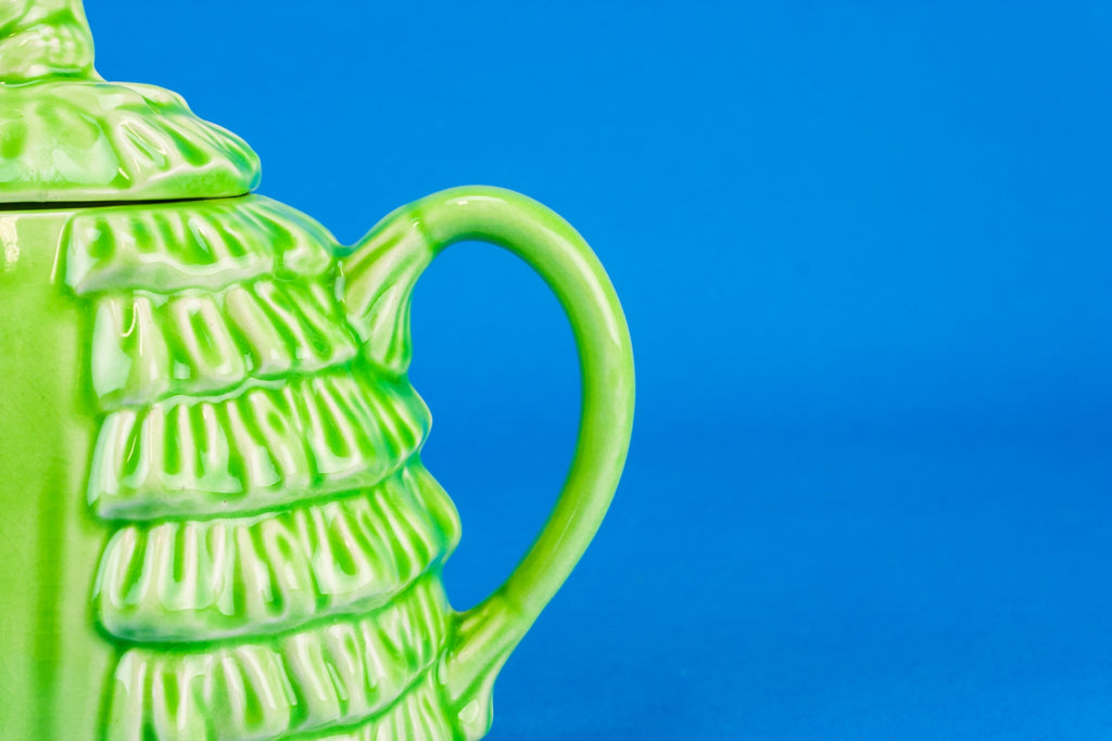 Green pottery teapot