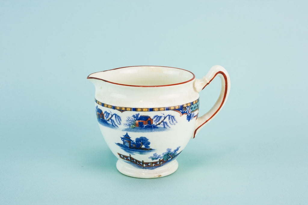 Blue pottery creamer
