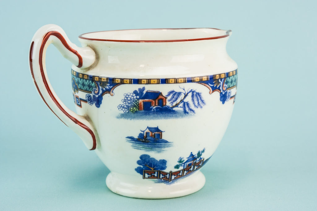 Blue pottery creamer