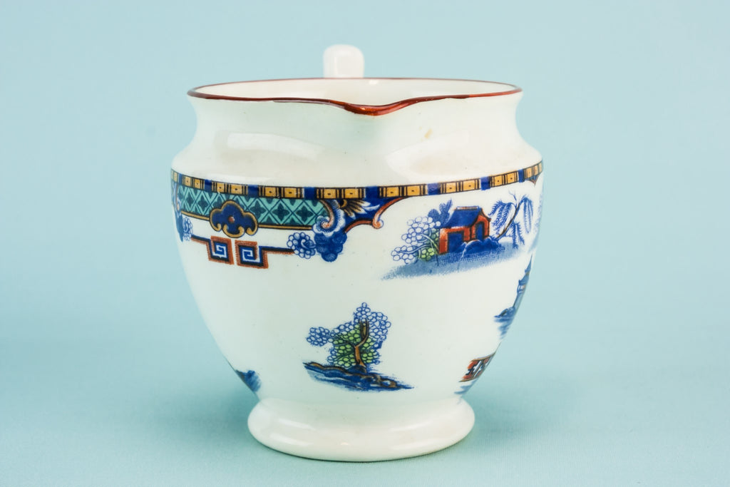 Blue pottery creamer