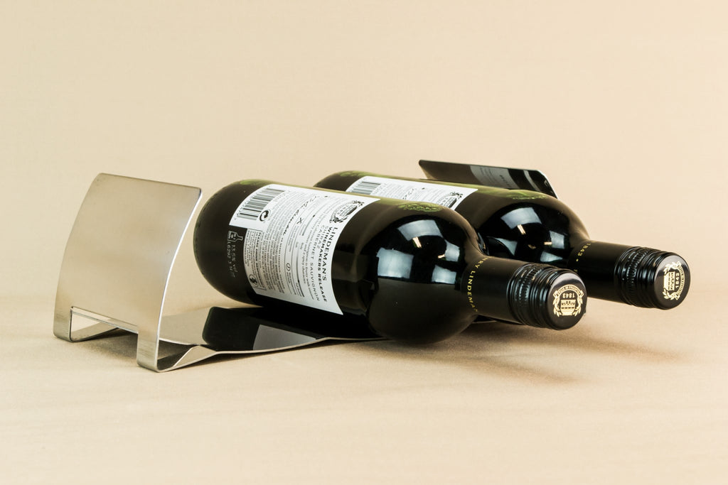 Modernist metal wine carrier