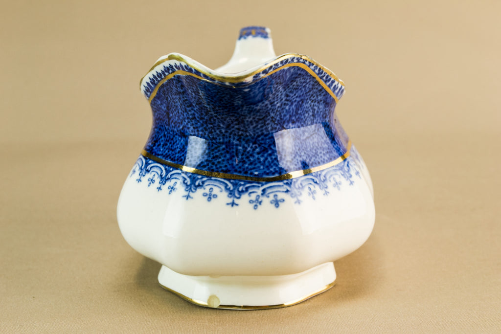 Traditional pottery gravy boat