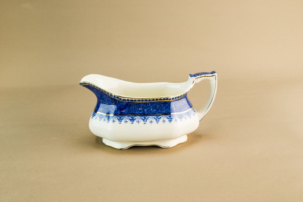 Traditional pottery gravy boat