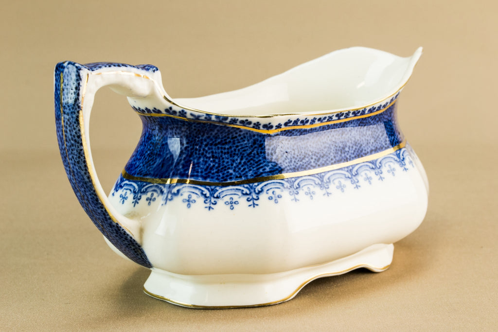 Traditional pottery gravy boat