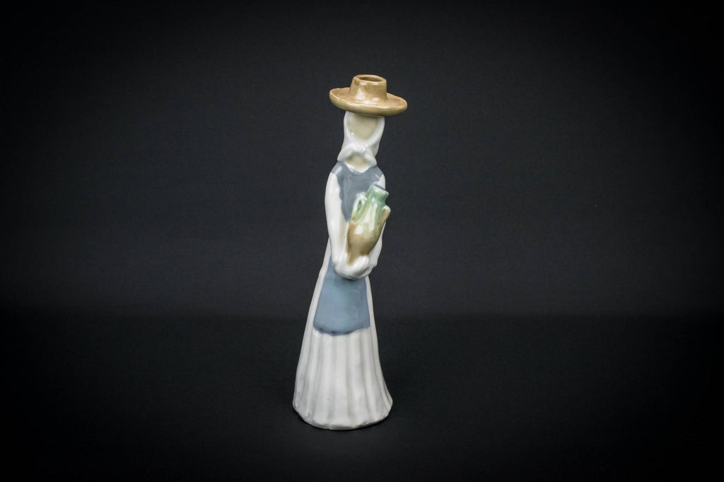 Girl figure candlestick