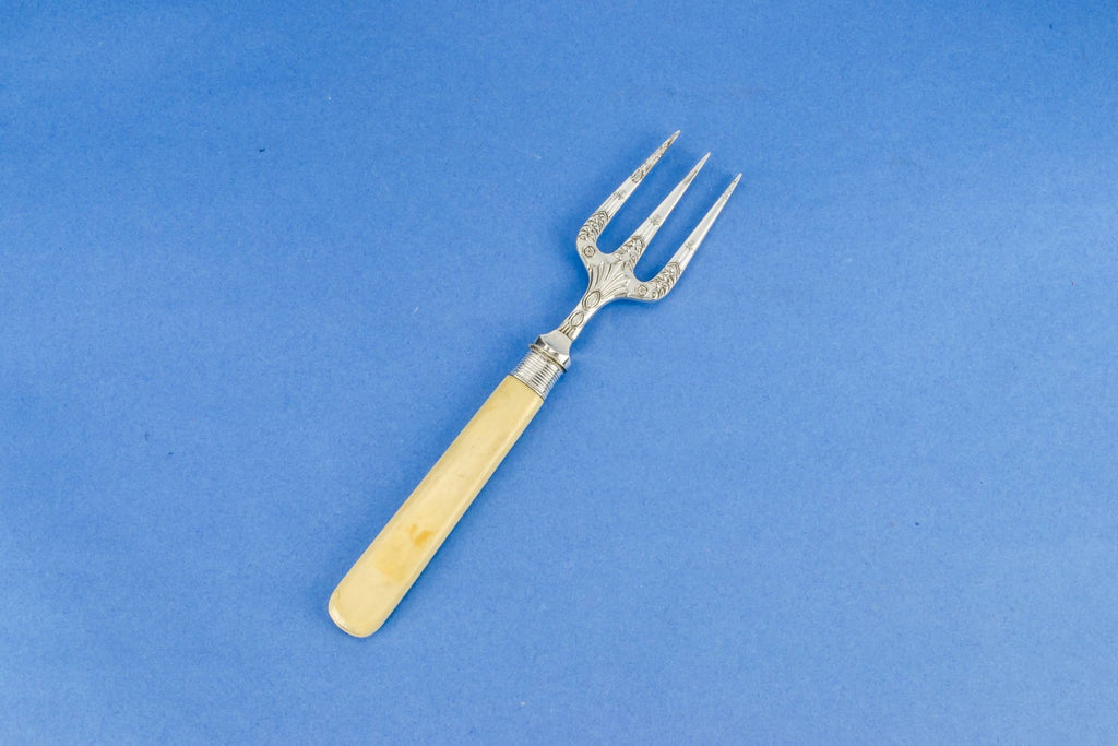 Ornate serving fork