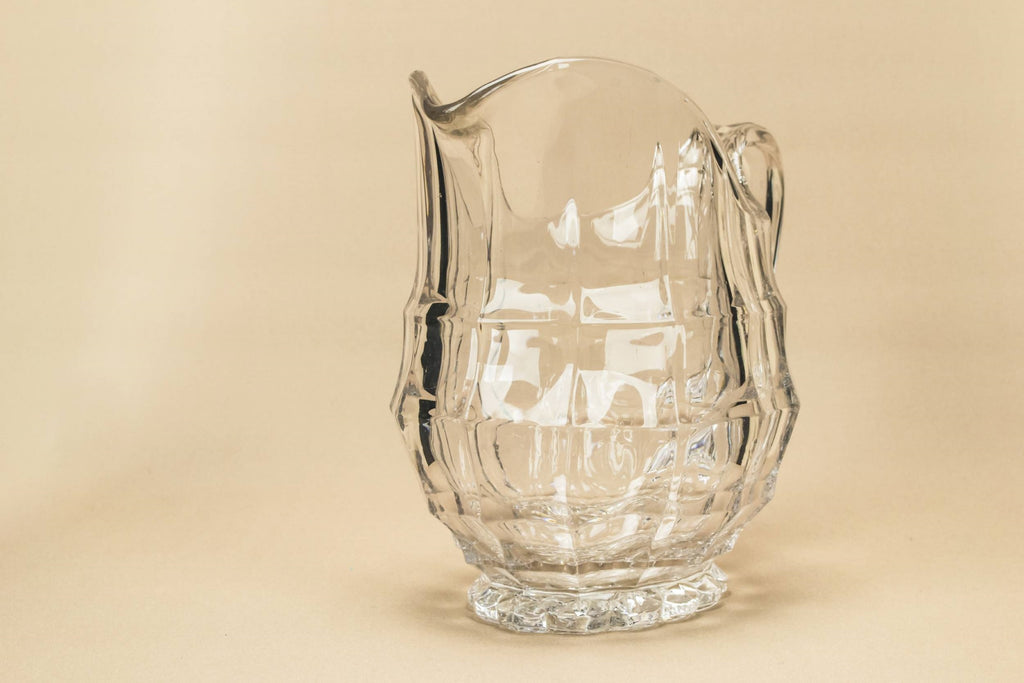Helmet shaped glass jug