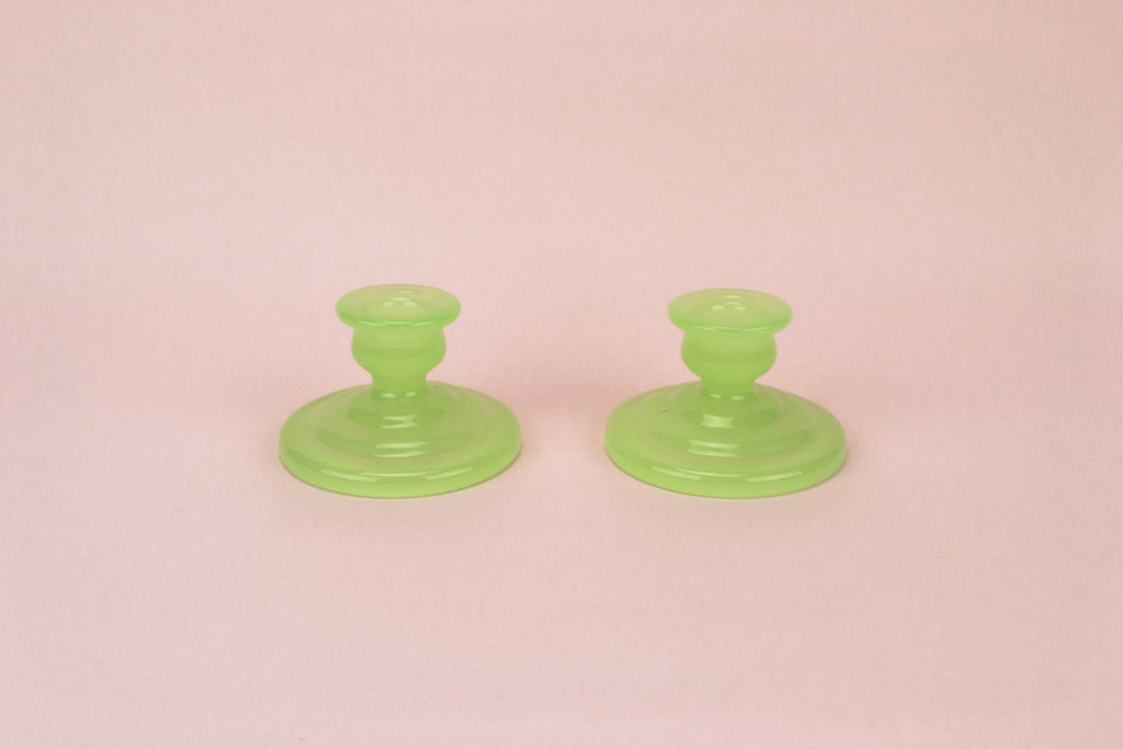 2 green glass candlesticks