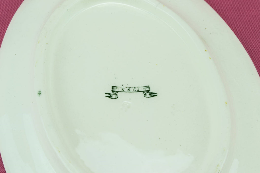 Green and white gravy boat