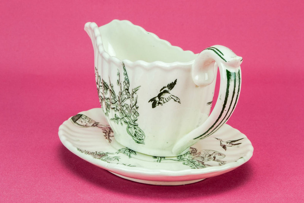 Green and white gravy boat