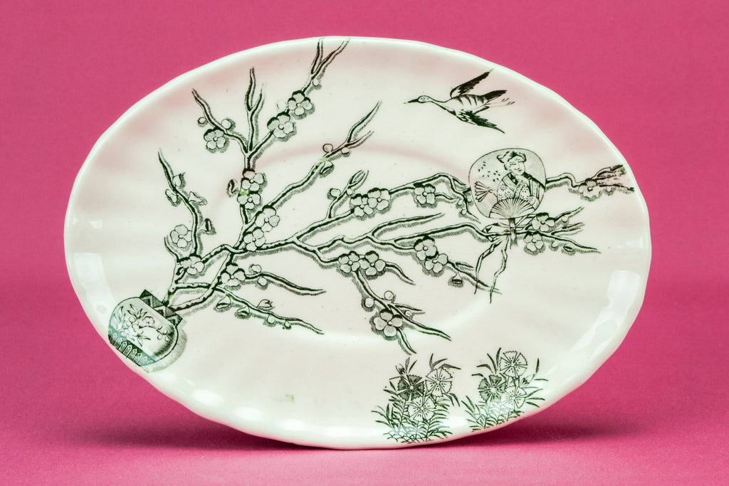 Green and white gravy boat