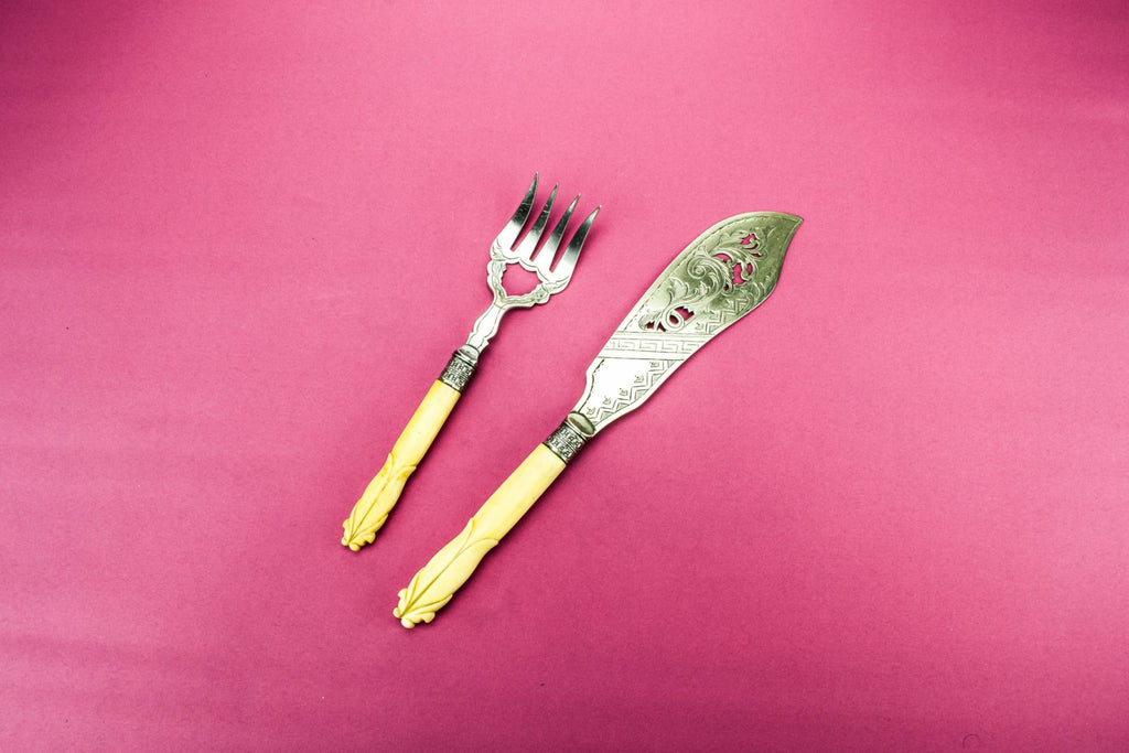 Fish serving fork and knife