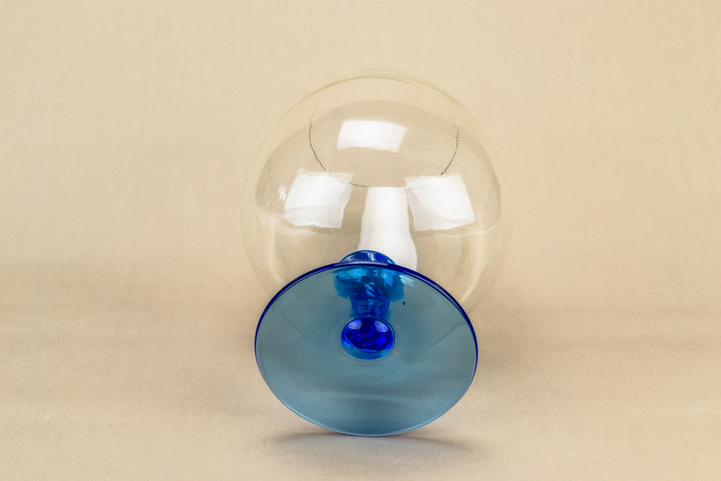 Blue glass vase on foot