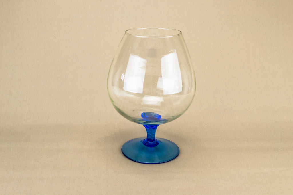 Blue glass vase on foot