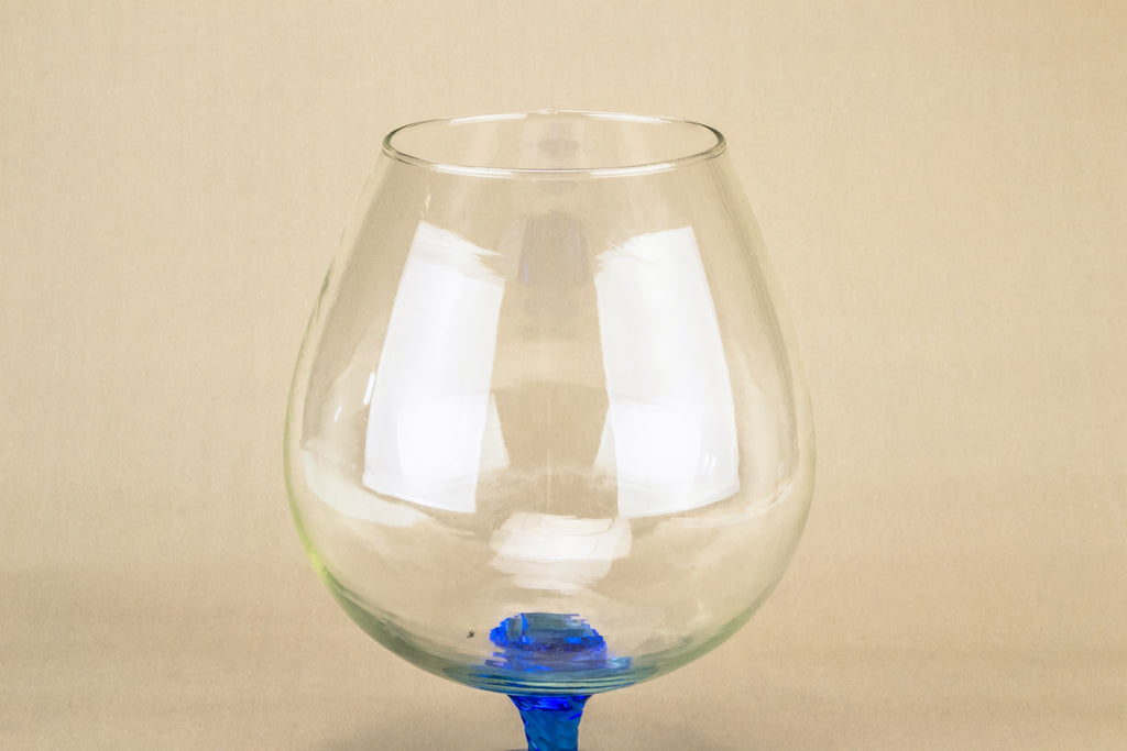 Blue glass vase on foot