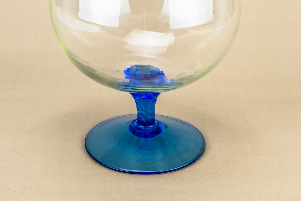 Blue glass vase on foot