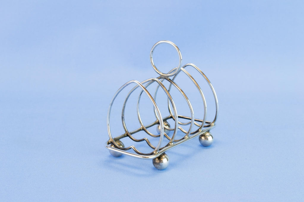 Arts & Crafts sterling silver toast rack, 1914