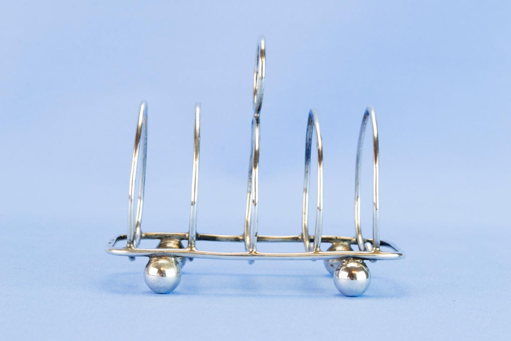 Arts & Crafts sterling silver toast rack, 1914