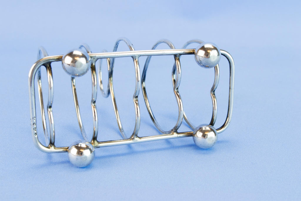 Arts & Crafts sterling silver toast rack, 1914