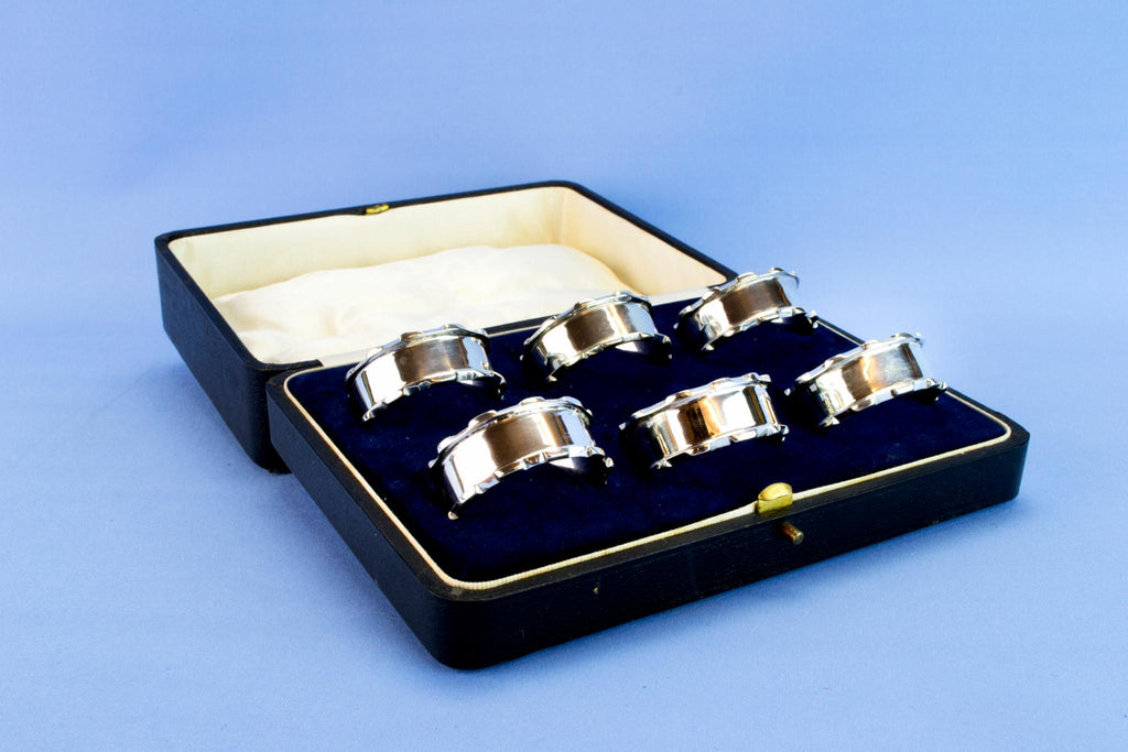 6 sterling silver napkin rings, 1926