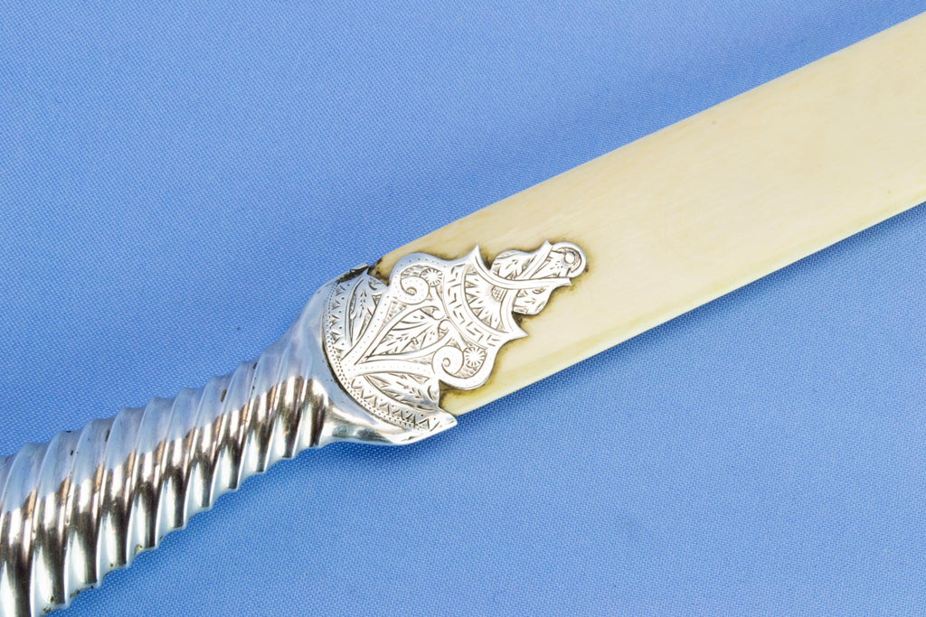 Sterling silver & Ivory page turner, 1890
